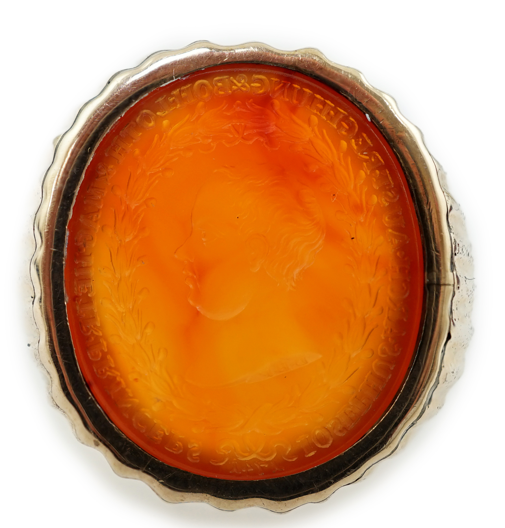 An antique Austro Hungarian gold and carnelian intaglio set oval ring, carved with the bust to dexter of Arch Duke Joseph
